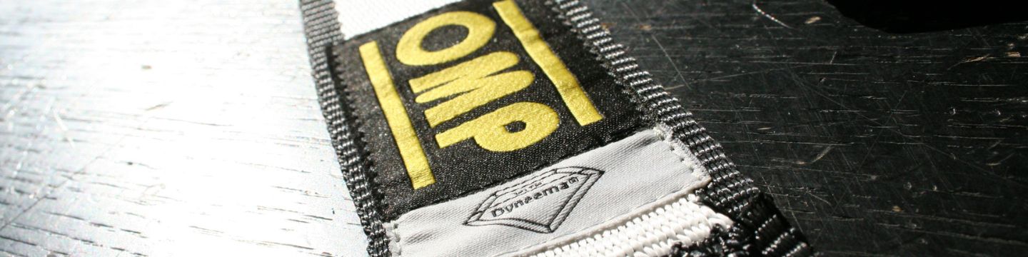 In primo piano logo OMP 