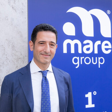Ritratto di Marco Bellucci, presidente di Mare Group, in ambiente professionale.