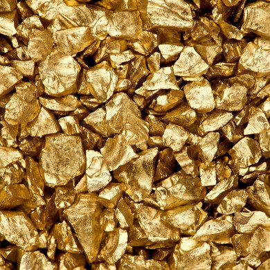 Pepite d’oro grezzo su sfondo neutro