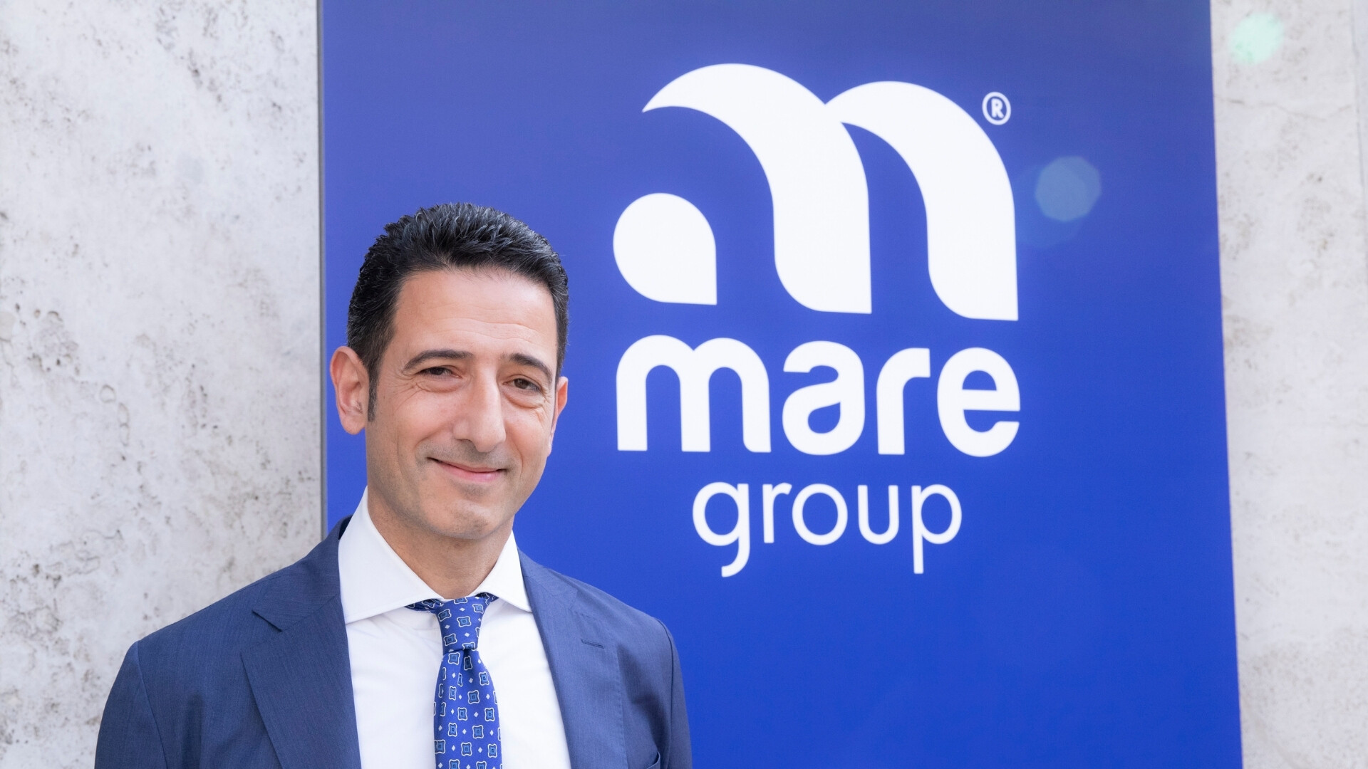 Ritratto di Marco Bellucci, presidente di Mare Group, in ambiente professionale.