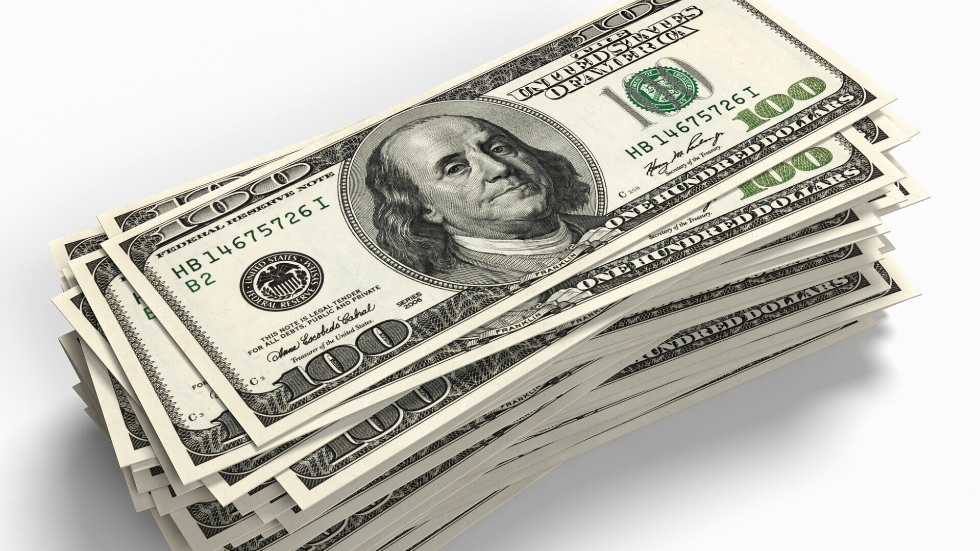 Mazzo di banconote da 100 dollari americani, simbolo di ricchezza, finanza e transazioni economiche.