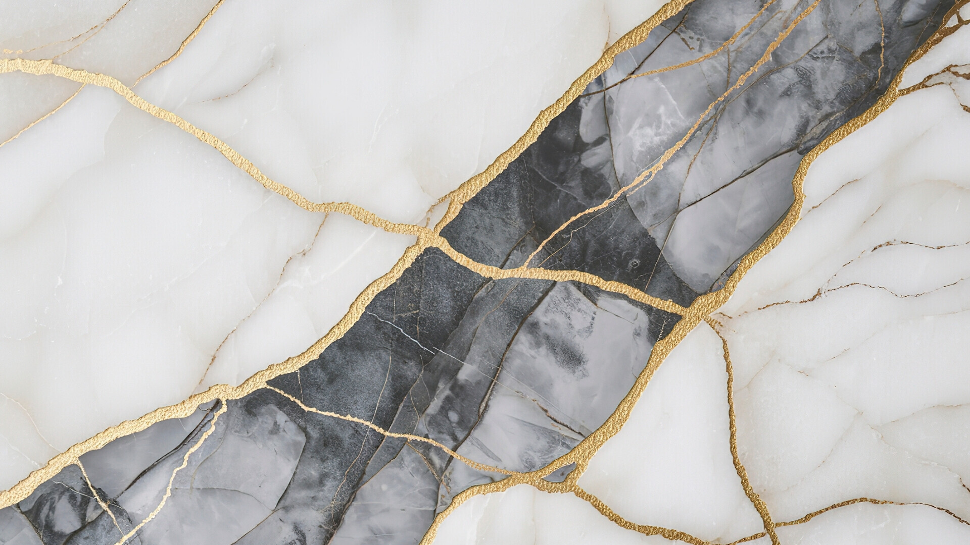 Superficie di marmo con combinazione di bianco, grigio e oro Foto di una superficie in marmo con combinazione di colori bianco, grigio e oro.