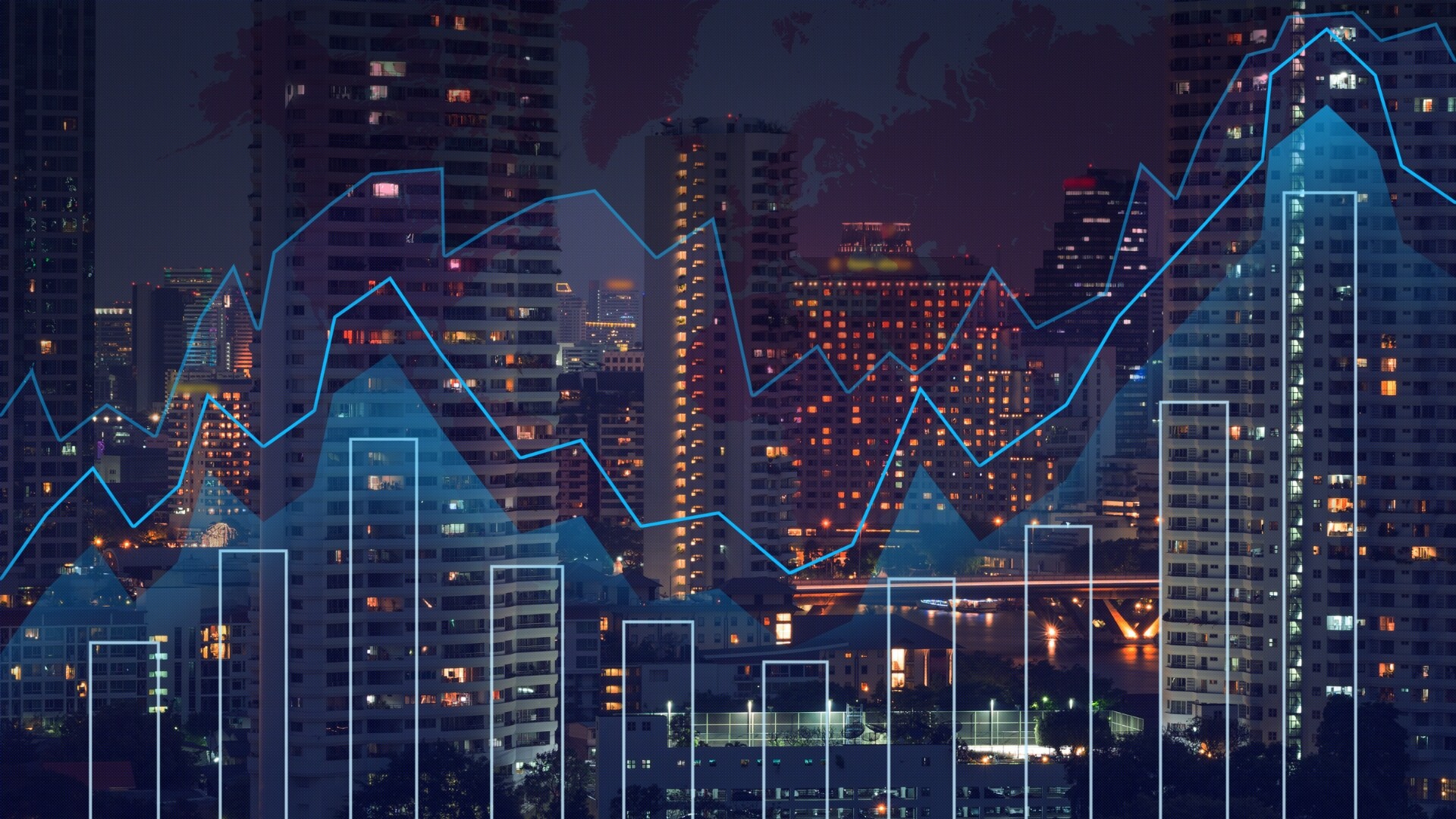 Grafici finanziari a colonne e linee su uno skyline notturno skyline